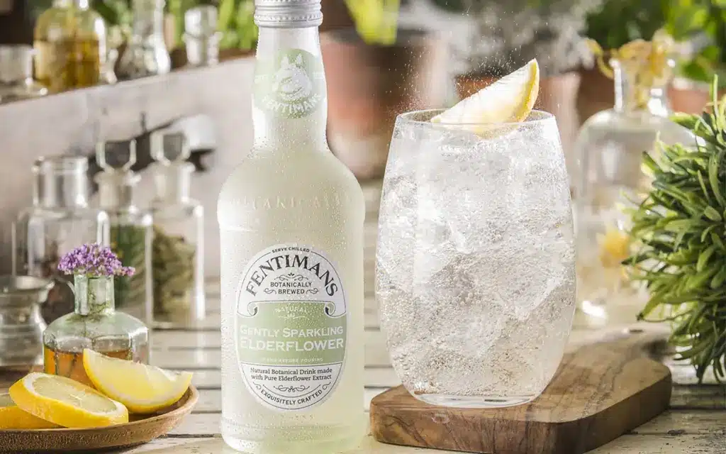 Fentimans rose lemonade served on a table by a window