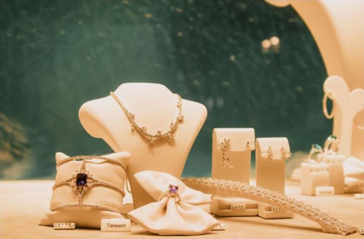 Luxury jewellery display in a boutique store window, representing the Mappin & Webb x Lydia Millen influencer partnership