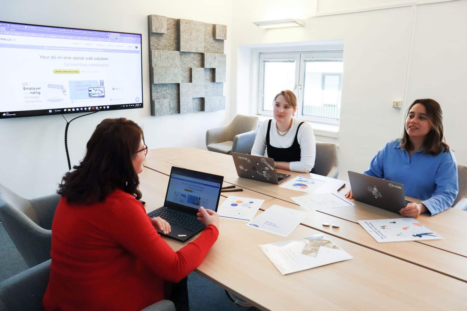 A marketing team planning a B2B influencer marketing campaign together
