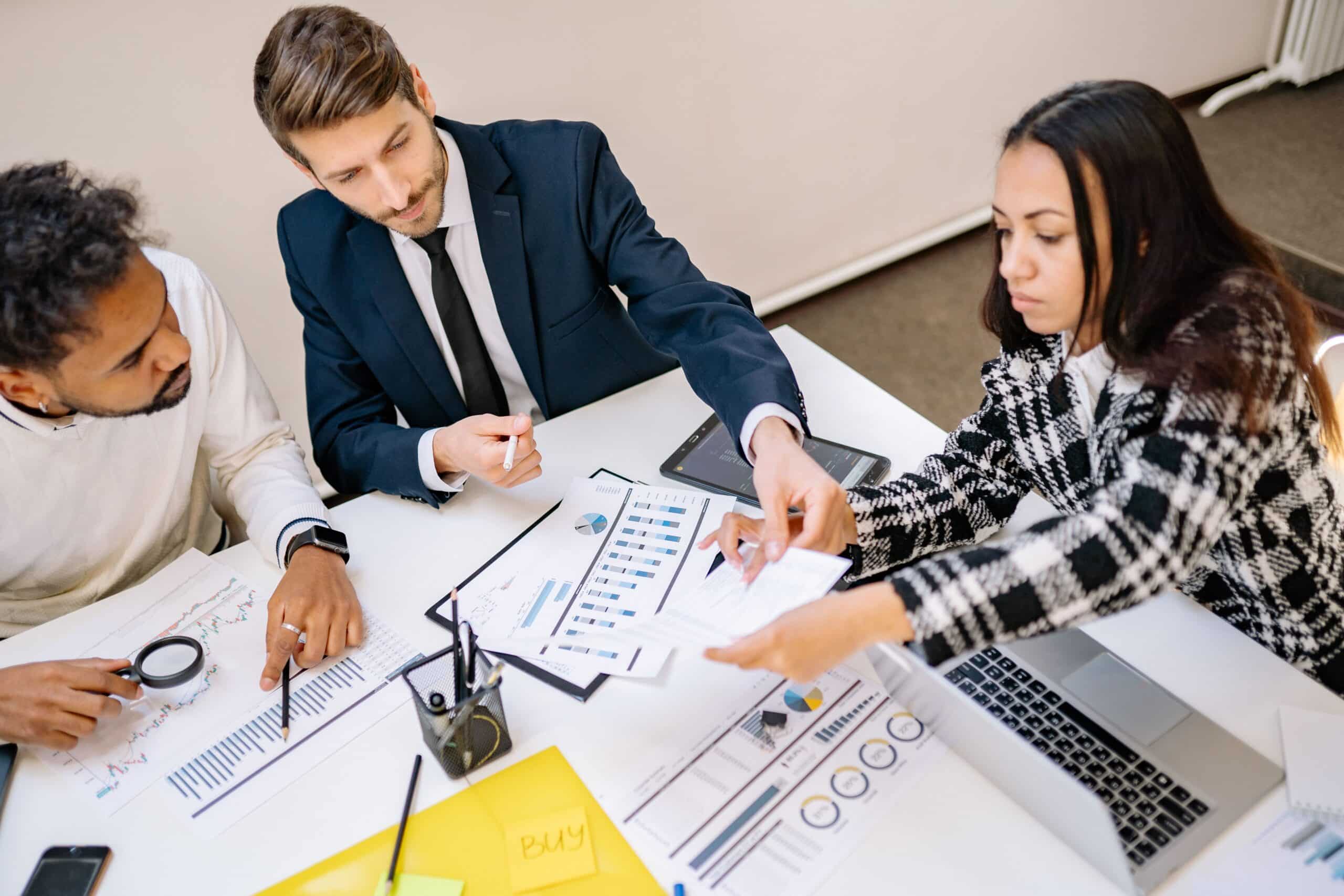 A team holding a post-crisis debrief meeting to review what the response got right and wrong