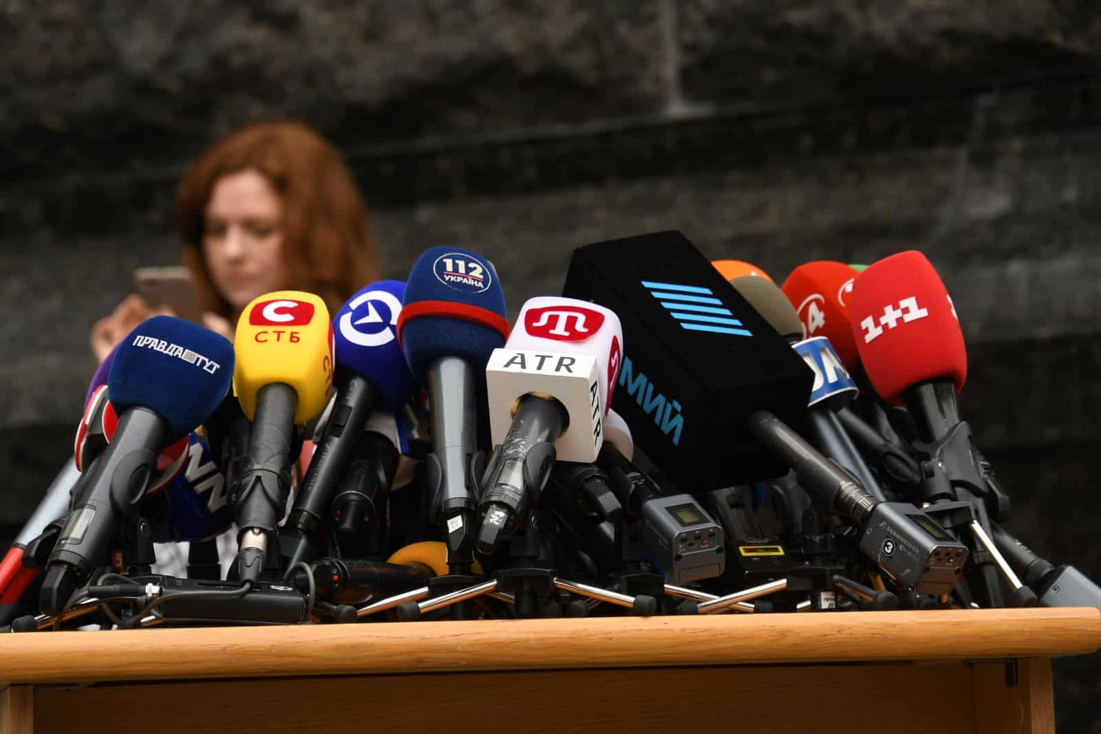 Row of press microphones set up for a crisis press statement