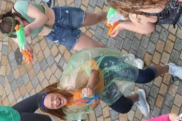 People having a water fight to celebrate Songkran